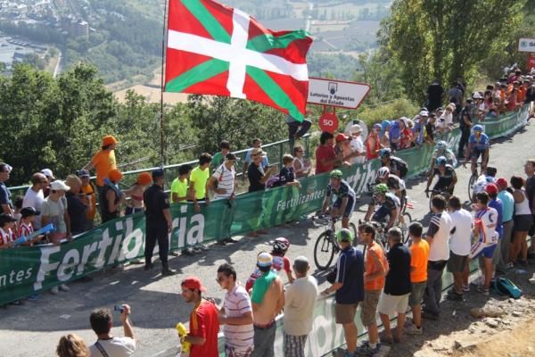 Movistar racers comes up the hill