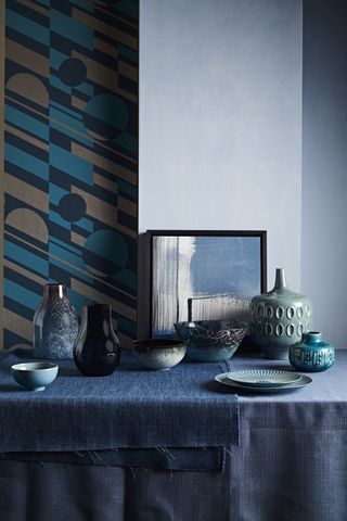 Mini Moderns Pluto Wallpaper in Lido and Copper, from John Lewis. £55