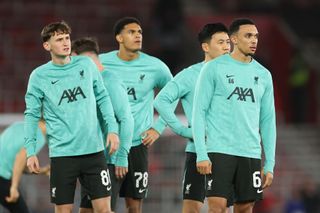 SOUTHAMPTON, ENGLAND - DECEMBER 18: Trent Alexander-Arnold and Tyler Morton of Liverpool warm up, with teammates prior to the Carabao Cup Quarter Final match between Southampton and Liverpool at St Mary's Stadium on December 18, 2024 in Southampton, England. (Photo by Michael Steele/Getty Images)