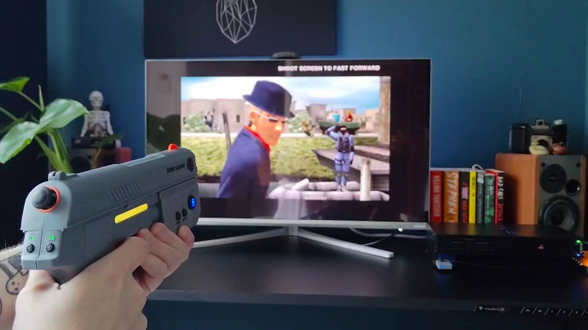 Intec Time Breaker Lightgun facing monitor with Time Crisis cutscene playing featuring Jacob Kinisky.