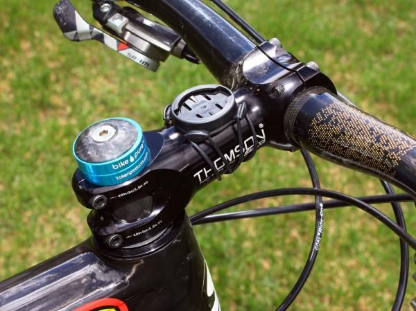 Compton (Planet Bike-Stevens Bikes-Kenda) doesn't like the feel of a negative-rise stem so she runs the headset without the upper cover so that she can drop the front end a few extra millimeters.