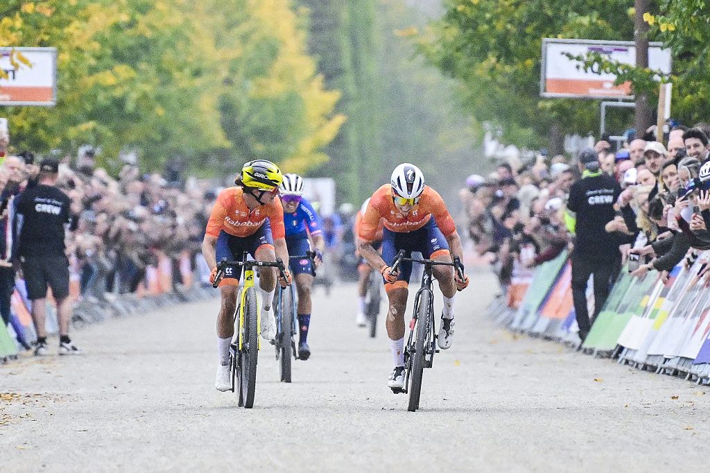 Dutch Marianne Vos and Dutch Lorena Wiebes battle with in the sprint to win the women elite race at the UCI World Gravel Championships, Saturday 11 October 2025, in Maastricht, The Netherlands. BELGA PHOTO DIRK WAEM (Photo by DIRK WAEM / BELGA MAG / Belga via AFP)