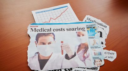 News headlines of medical costs soaring with top one picturing a scientist looking at a blood sample.