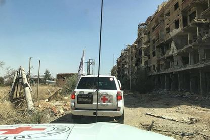 The International Committee of the Red Cross convoy enters Daraya.
