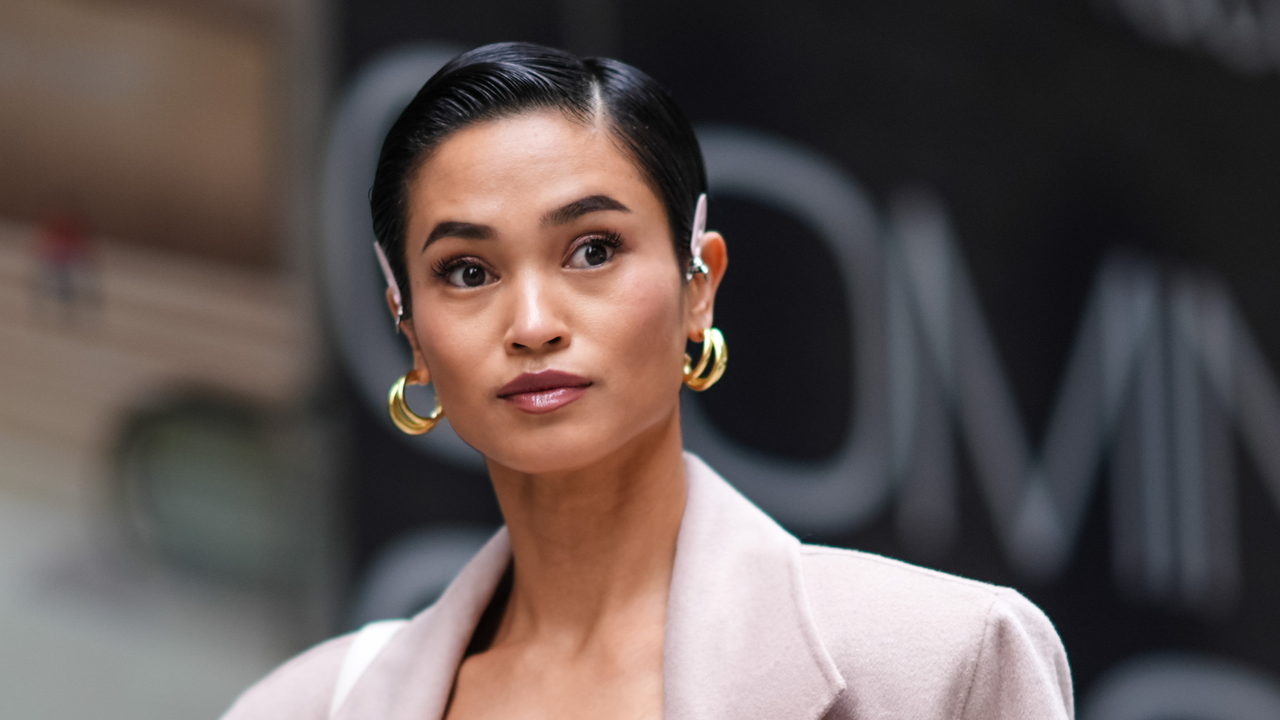 Woman during New York Fashion Week with a cropped hairstyle and beautiful groomed and bushy brows - revitabrow