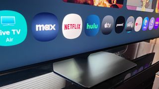 Samsung QN90F pedestal stand on TV stand