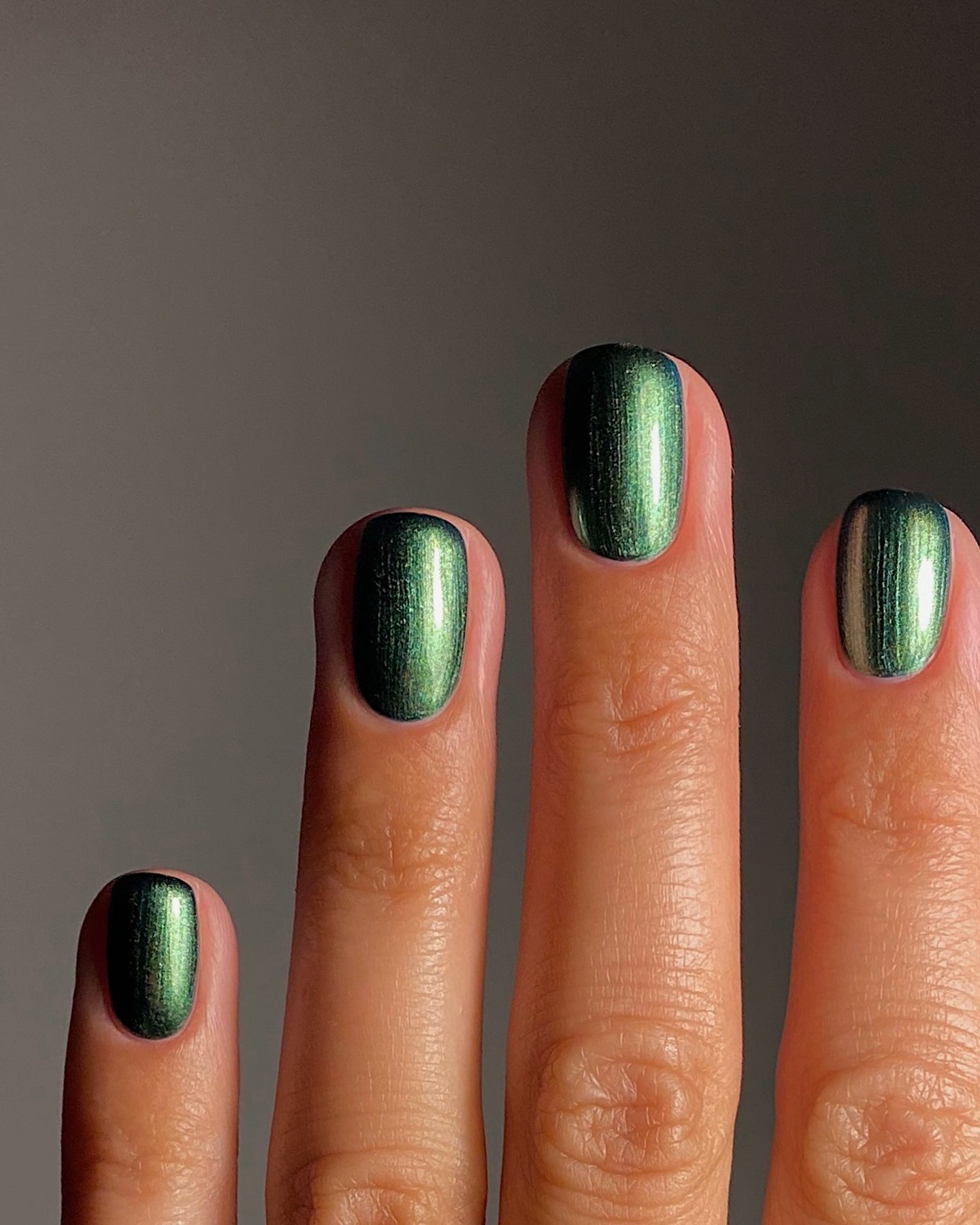 Green glazed nails.