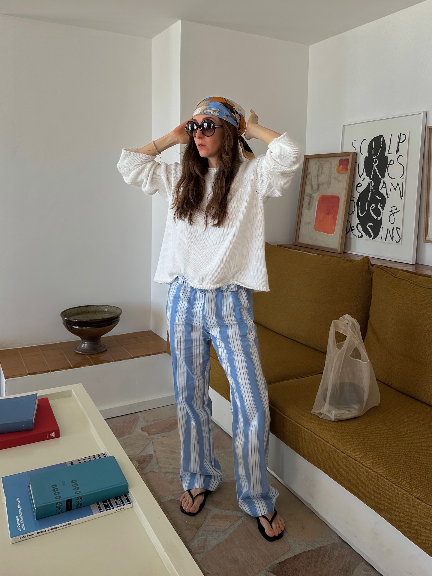 Influencer Sarah Rose Palm wearing blue striped trousers.