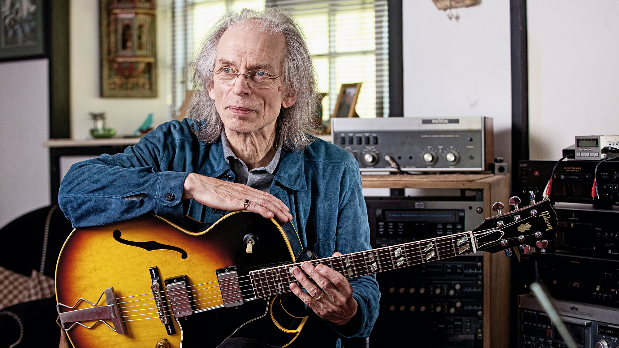 Steve Howe and his guitar collection at his home in Romanleigh, Devon. 22 May 2012
