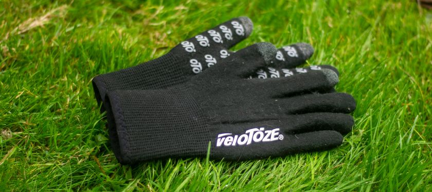 A pair of Velotoze knitted waterproof gloves 