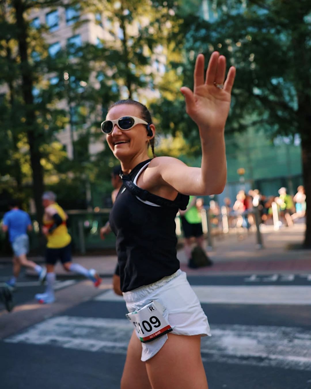 Best exercise headphones: Health Editor Ally Head testing the Powerbeats Pro 2 at the Big Half