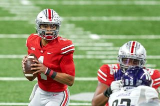 Ohio State Buckeyes quarterback Justin Fields looks up field during the Big Ten Championship against Northwestern on Dec. 19, 2020 at Lucas Oil Stadium in Indianapolis, Ind. 