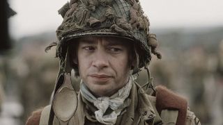 Dexter Fletcher looking offscreen in Band of Brothers