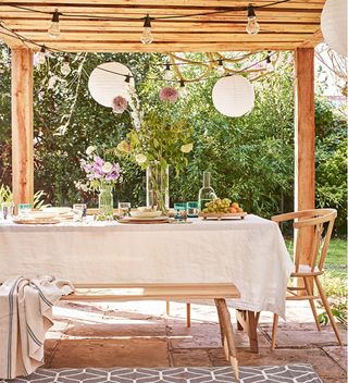 Pergola ideas with dining table and benches