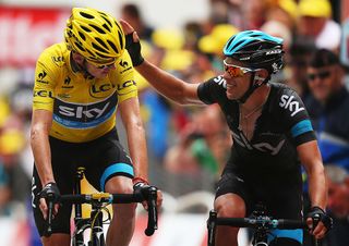 Chris Froome crosses the line with Richie Porte following a scare on the Alpe d'Huez in 2013