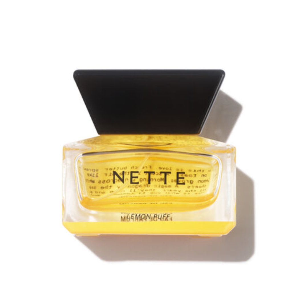 A product shot of the Nette NYC Lemon Puff Eau de Parfum, on a white background