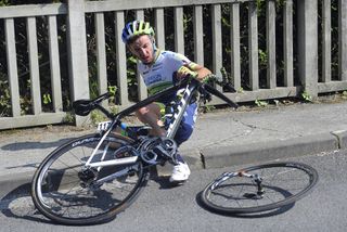 Adam Yates crashes on the final descent, snapping his forks and taking him out of contention