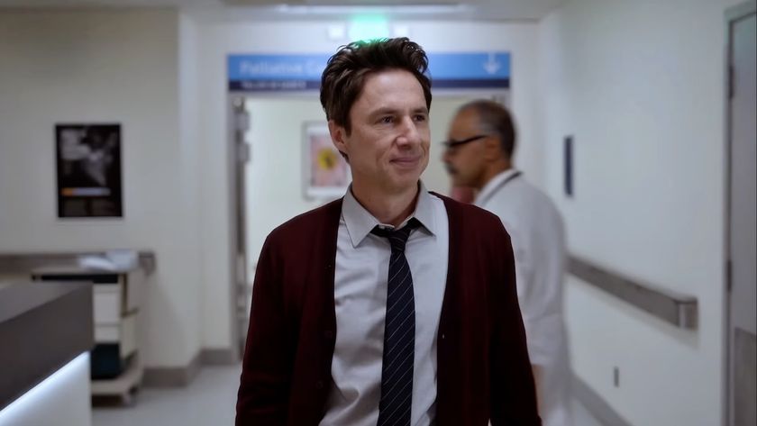 Zach Braff's JD walking down a hospital hallway in Scrubs revival