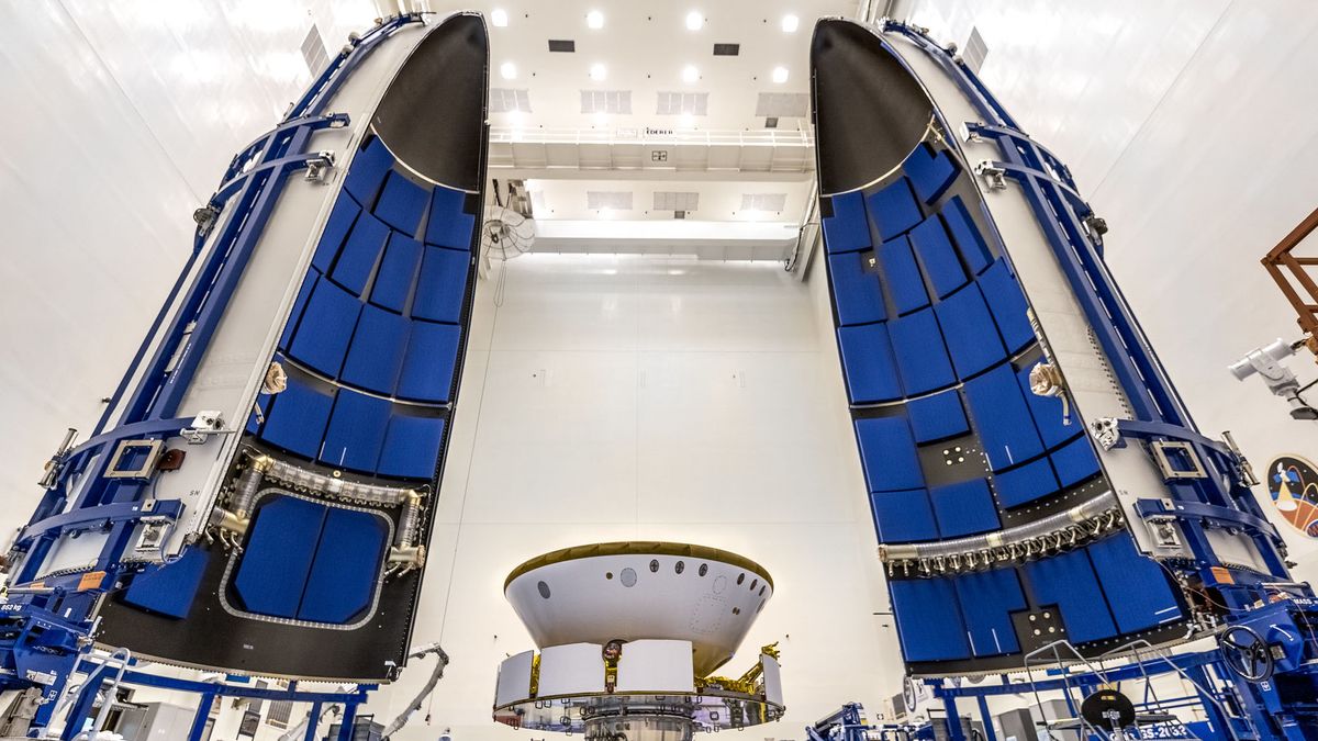 NASA&#039;s Mars 2020 Perseverance rover is prepared to be encapsulated in its Atlas V rocket payload fairing at NASA&#039;s Payload Hazardous Servicing Facility at the Kennedy Space Center in Florida on June 18, 2020.