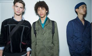 Male models wearing the Bottega Veneta Spring / Summer 2016 collection. The two models on the left have backpacks with them