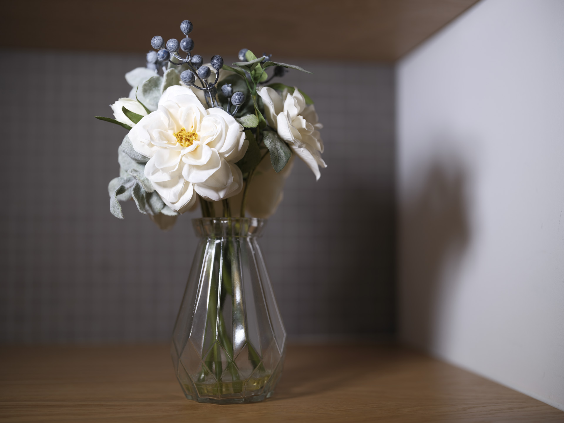 Flowers on a wooden table with Reala Ace Fujifilm film simulation