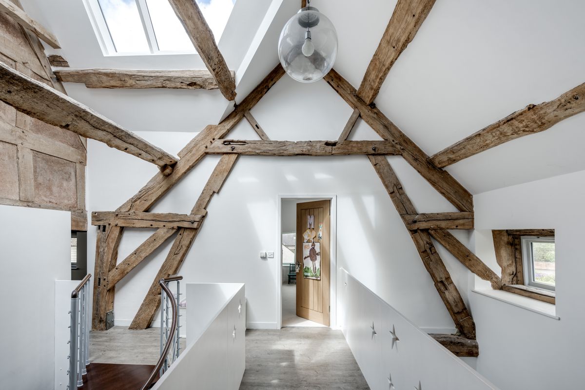 white bridge landing with stars cut out and exposed beams