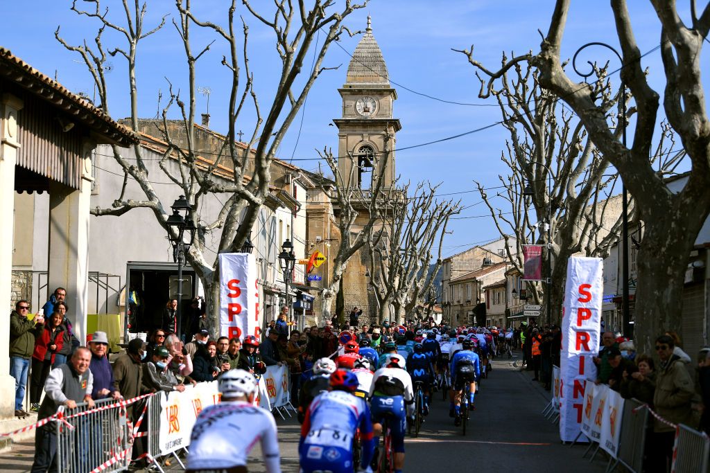 MANOSQUE FRANCE FEBRUARY 12A general view of the peloton passing through village landscape during the 6th Tour de La Provence 2022 Stage 2 a 1806km stage from Arles to Manosque 417m TDLP22 on February 12 2022 in Manosque France Photo by Luc ClaessenGetty Images