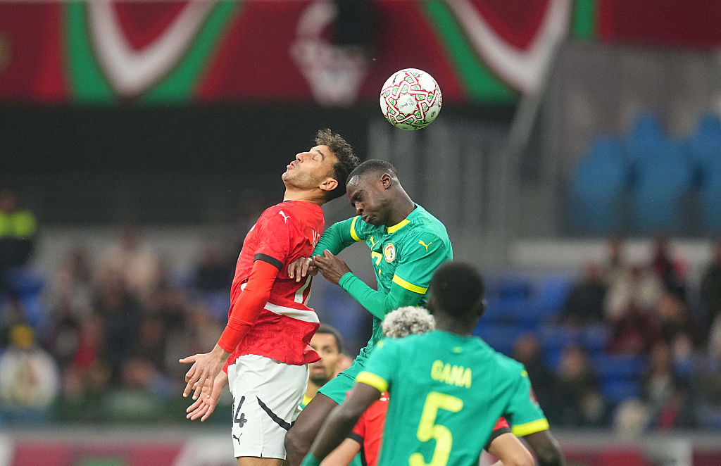 Hamdy Fathy Abdelhalim Abdel Fatth of Egypt and Mouhamadou Habib Mback&amp;eacute; Diarra of Senegal battle for the ball during the quarter final match between Senegal and Egypt at Tangier Stadium, Tangier, Morocco on January 14, 2026. (Photo by Ulrik Pedersen/NurPhoto via Getty Images)