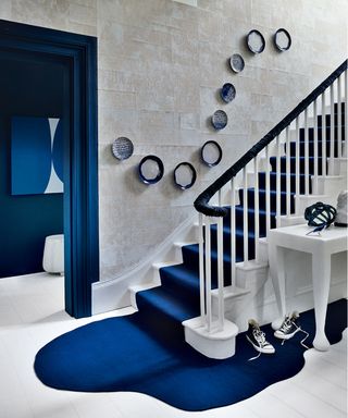 staircase wall ideas blue plates