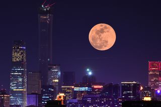 The super blue blood moon rises over Beijing, China on Jan. 31, 2018.