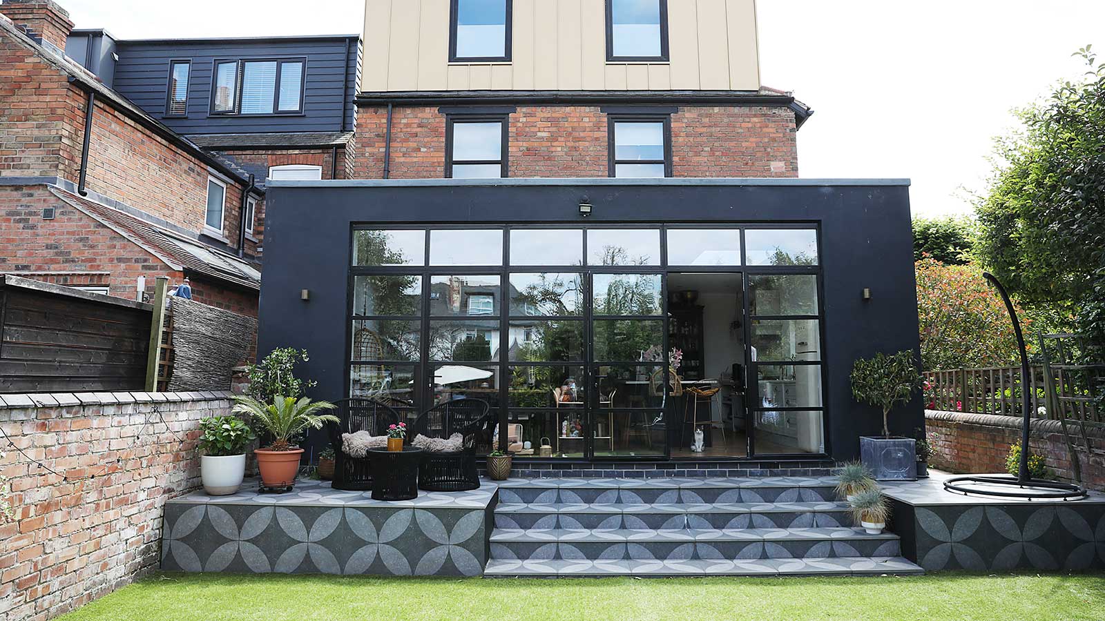 semi-detached house with full-width rear extension and dormer loft conversion