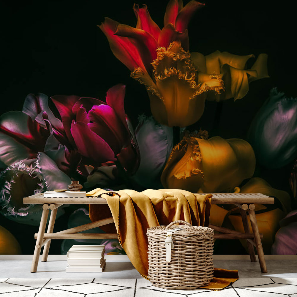 room with floral mural wallpaper and wooden bench and throw