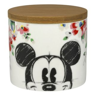 white biscuit tin with wooden top and mickey mouse print