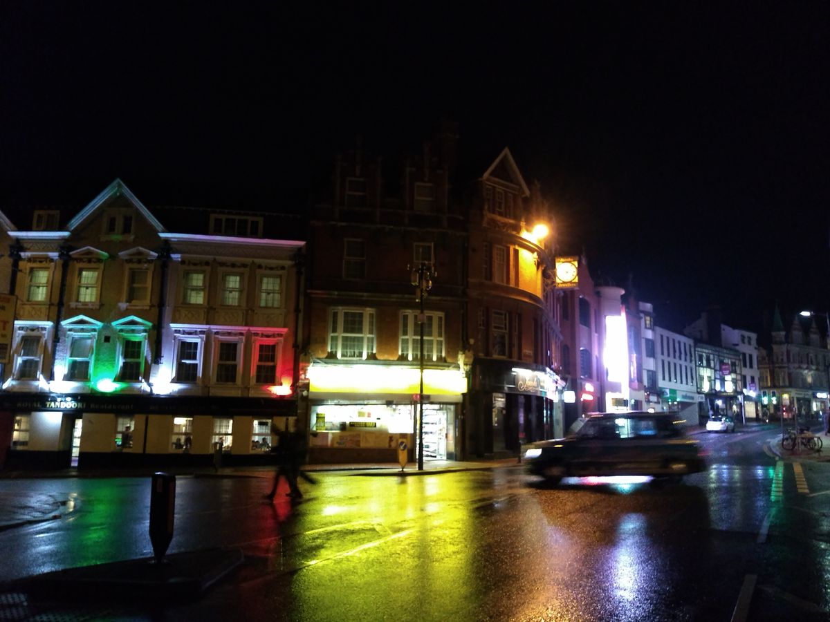 This neon-lit night scene is a lot softer than a day-lit one would be, but the colors are vivid.