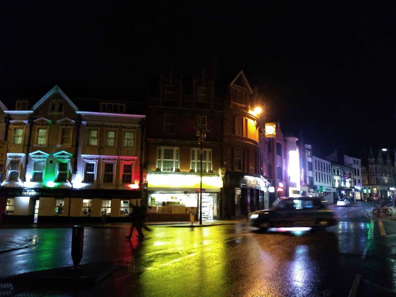 This neon-lit night scene is a lot softer than a day-lit one would be, but the colors are vivid.