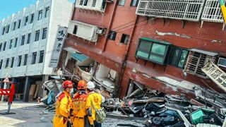 Fire fighters conduct search and rescue operations among collapsed buildings in Hualien, Taiwan. 