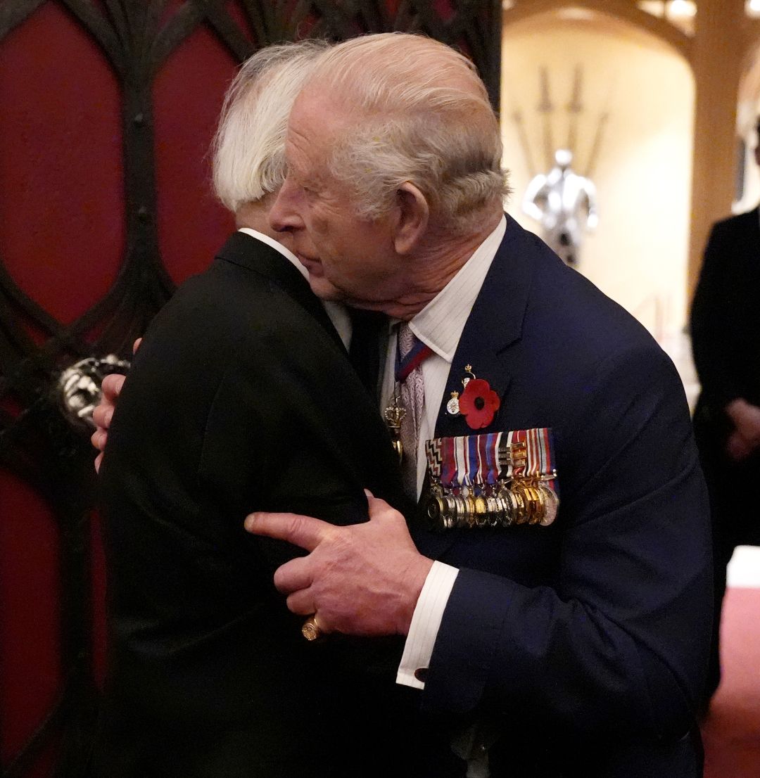 King Charles hugging a veteran