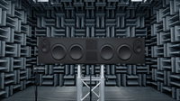A Canvas L audiophile soundbar in a sound-treated chamber on a metal scaffolding-style stand