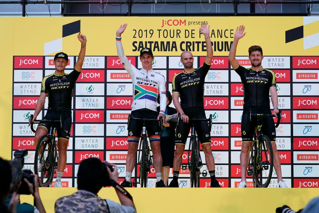 Riders do karate and football-darts before the 2019 Saitama Tour de France criterium