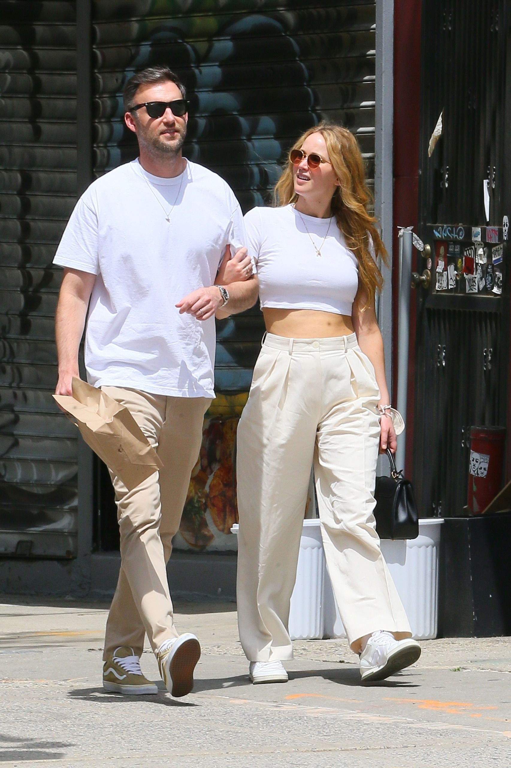 Jennifer Lawrence wore Dior's white Travel Sneakers in 2021