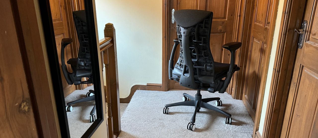 A full shot of the Herman Miller Embody in a hallway.