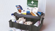 first aid kit with bandage tape medicine