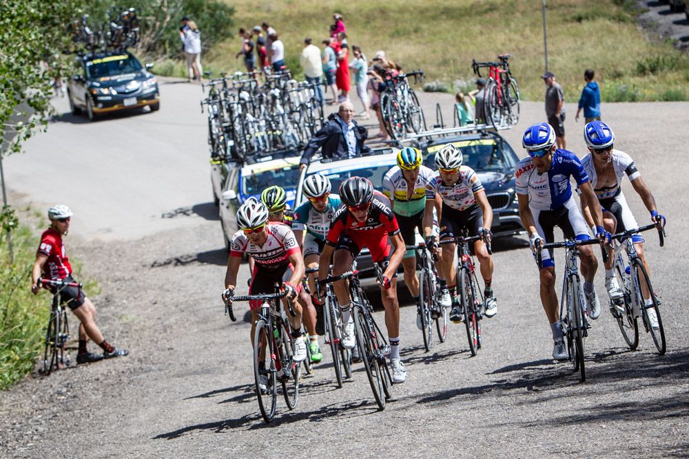 A group of riders hits the tough Guardsmans Pass climb.