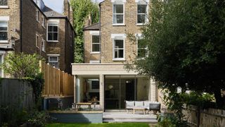 brick single storey rear extension to a three storey London townhouse