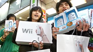 Customers in Japan buying Nintendo's new Wii console in 2006