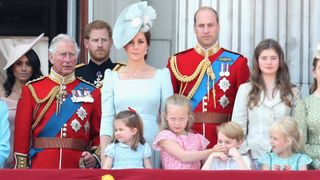 Meghan, Duchess of Sussex, Prince Charles, Prince of Wales, Prince Harry, Duke of Sussex, Catherine, Duchess of Cambridge, Princess Charlotte of Cambridge, Savannah Phillips, Prince George of Cambridge watch the flypast on the balcony of Buckingham Palace during Trooping The Colour