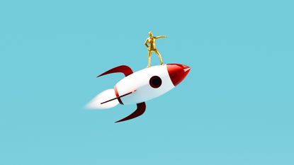 A drawing of a rocket ship with a golden man on top of it.