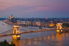 Panorama of the Hungarian Parliament, and the Chain bridge (Szechenyi Lanchid), over the River Danube, Budapest, Hungary