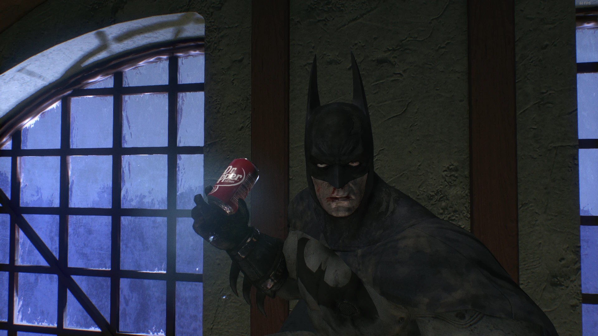 Batman, nose bleeding, wields a can of Dr Pepper in Arkham Knight.
