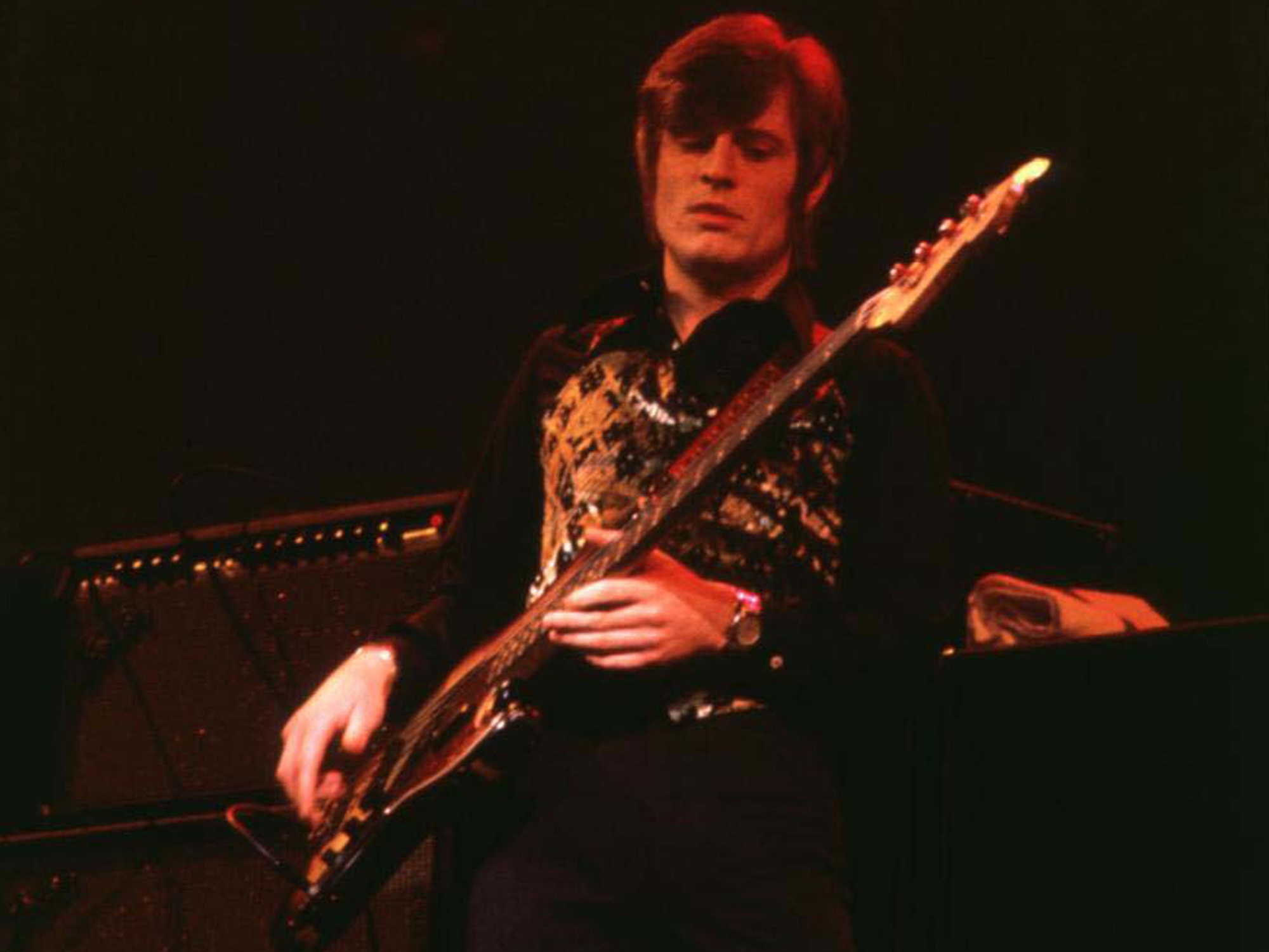 John Paul Jones performs onstage with Led Zeppelin at Chicago Stadium in Chicago, Illinois on January 20, 1975